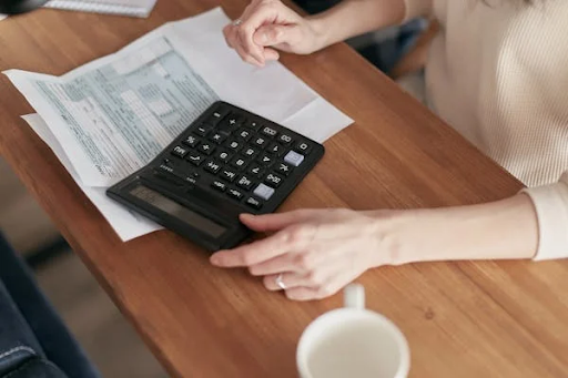 Bookkeeper working on manual invoicing 